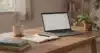 Realistic photo of a writer's desk setup used with AI writing tools